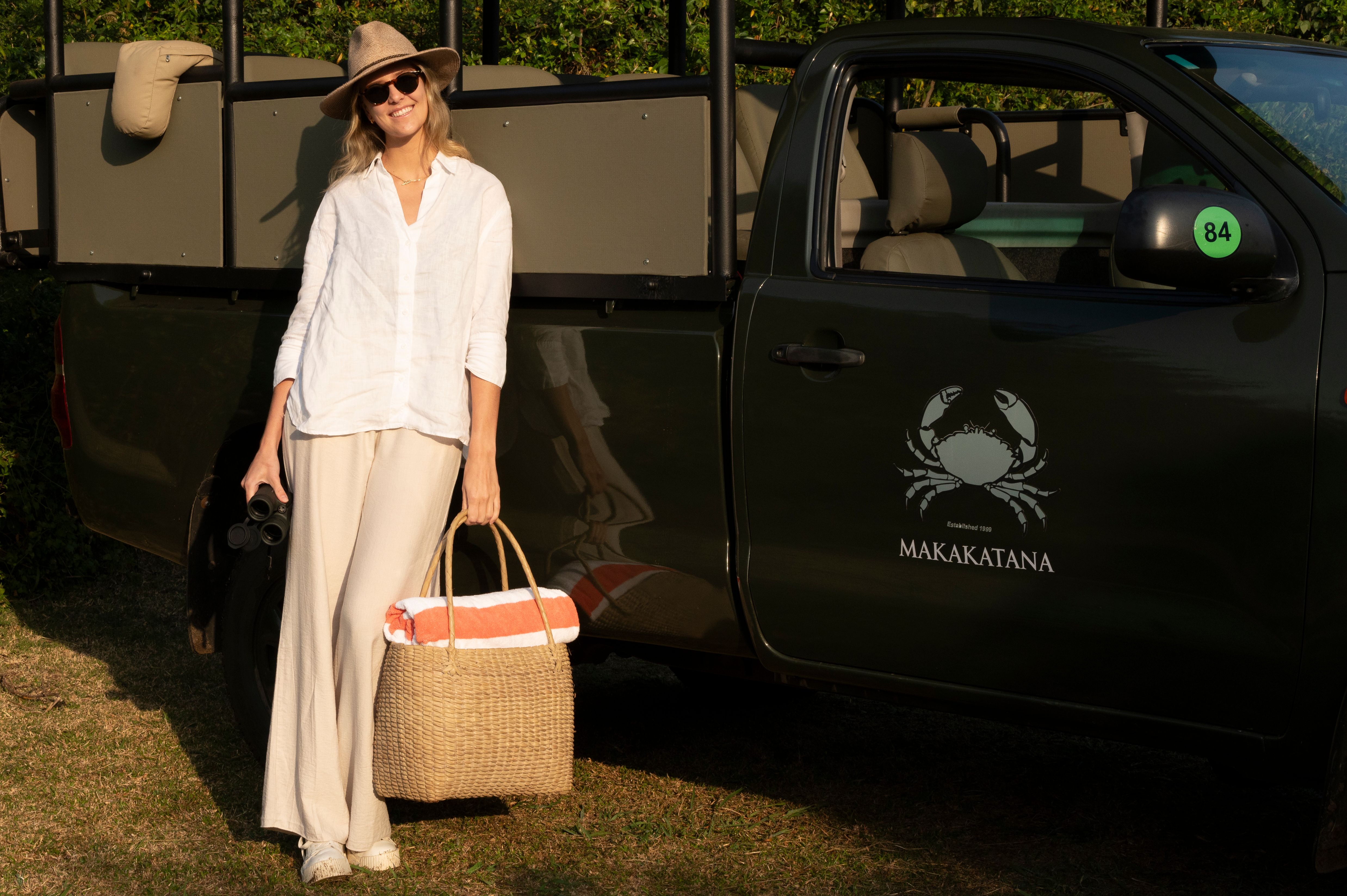 girl in front of game vehicle
